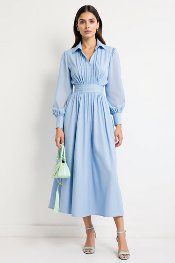 Robe de travail bleue à col polo froncé avec manches longues